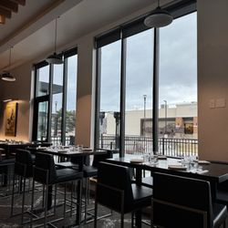 City Vineyard - Big windows overlook a patio