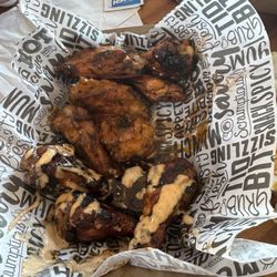 Wing Daddy - Snoop drizzle, Buffalo Garlic and Maple Bacon Bourbon.