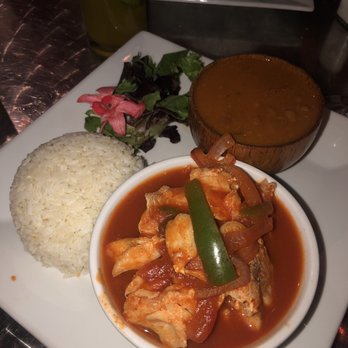 Terra Luna Cafe - Haddock in creole sauce with rice and beans - Latin American Near Me - Lawrence, Massachusetts