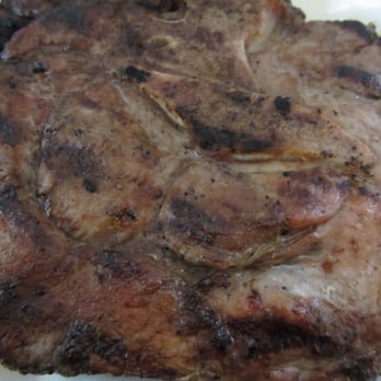 Ihawan - Close-up of grilled marianted pork chop - Filipino Near Me - Woodside, New York