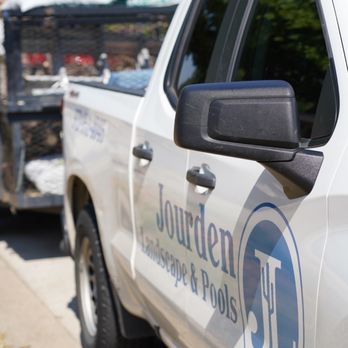 Jourden Landscape and Pools - trucks parked on the side of the road - Landscaping Near Me Jourden Landscape and Pools - trucks parked on the side of the road - Landscaping Near Me