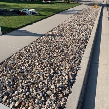 Rock N Yard Landscape Materials - a gravel bed in front of a house - Couriers & Delivery Services Near Me - Copperton, Utah Rock N Yard Landscape Materials - a gravel bed in front of a house - Couriers & Delivery Services Near Me - Copperton, Utah