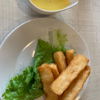 Kotosh - YUCA A LA HUANCAÍNA
Fried Yuca with spicy cheese sauce (vegetarian). - Sushi Bars Near Me - Lomita, California Kotosh - YUCA A LA HUANCAÍNA
Fried Yuca with spicy cheese sauce (vegetarian). - Sushi Bars Near Me - Lomita, California