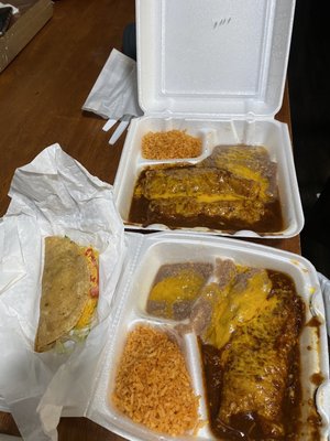 Photo of Rosa Maria's - San Bernardino, CA, US. Beef taco no Lettie no tomato n enchiladas no Letus no tomato.  Only messy because I knocked over in car.