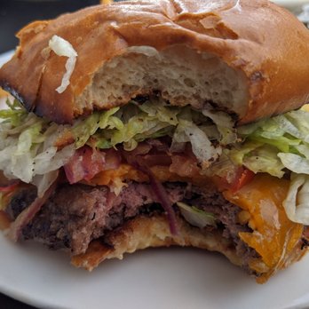 Chef Rick's - A bite of my monster burger - New American Near Me - Orcutt, California