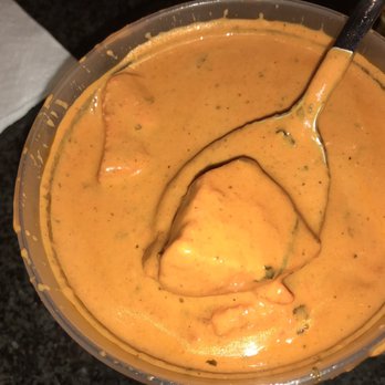 Flavors - a bowl of peanut butter with a spoon in it - Indian Near Me - Farmington Hills, Michigan Flavors - a bowl of peanut butter with a spoon in it - Indian Near Me - Farmington Hills, Michigan