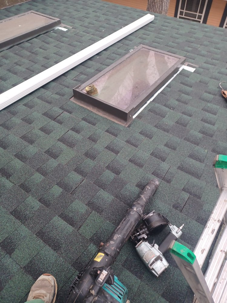 Slide of Stallion Roofing Company