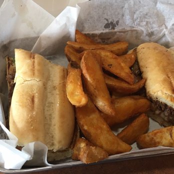 The Bucket - Philly steak sub with potato wedges - New American Near Me - Charleston, West Virginia The Bucket - Philly steak sub with potato wedges - New American Near Me - Charleston, West Virginia