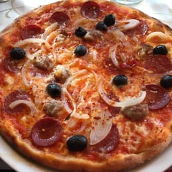 Pizzaria Etna - Mafia pizza. Super tasty and pretty spicy too. :)