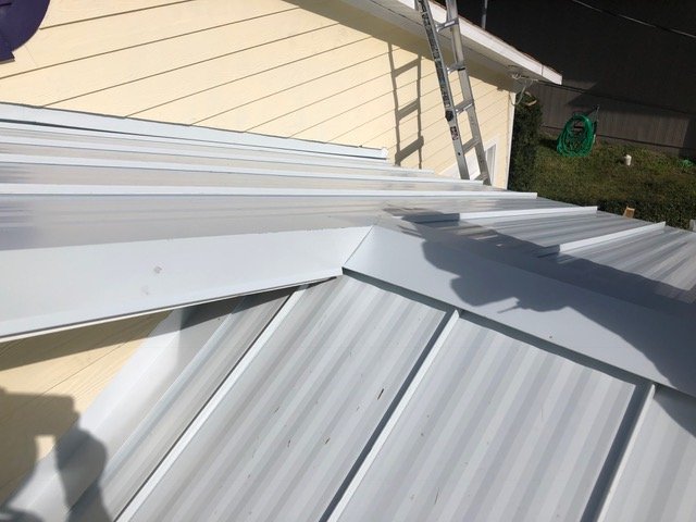 Slide of Collis Roofing