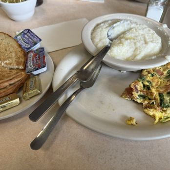 Perry's Cafe & Deli - Spinach bacon and Swiss omelet with rye toast and grits - Delis Near Me - Atlantic City, New Jersey Perry's Cafe & Deli - Spinach bacon and Swiss omelet with rye toast and grits - Delis Near Me - Atlantic City, New Jersey