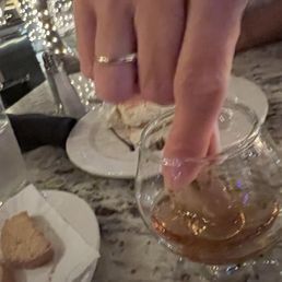 Dipping the biscotti in the Amaretto Dipping the biscotti in the Amaretto