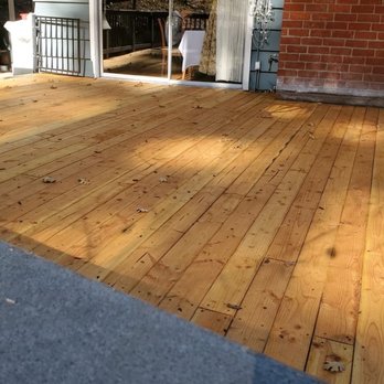 Anderson Construction Services - a wooden deck with a fire hydrant - General Contractors Near Me Anderson Construction Services - a wooden deck with a fire hydrant - General Contractors Near Me