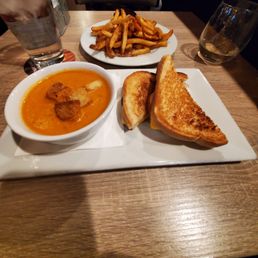 Lunch special: grilled cheese with tomato soup. Added fries on the side. Lunch special: grilled cheese with tomato soup. Added fries on the side.