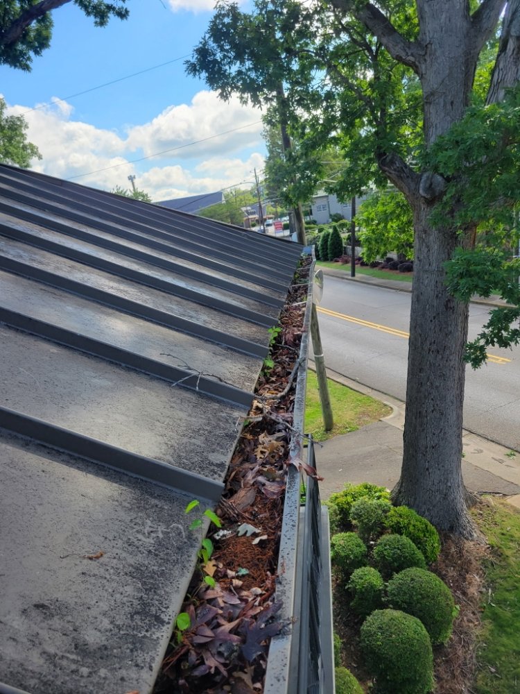 Slide of Benitez Roofing