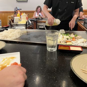 Sake Japanese Restaurant - a chef preparing a meal - Sushi Bars Near Me - Beavercreek, Ohio Sake Japanese Restaurant - a chef preparing a meal - Sushi Bars Near Me - Beavercreek, Ohio
