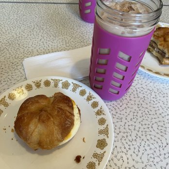 Sippers Coffeehouse - Sausage egg and cheese croissant Ice blueberry Latte with oat milk - Coffee & Tea Near Me - Jacksonville, Florida Sippers Coffeehouse - Sausage egg and cheese croissant Ice blueberry Latte with oat milk - Coffee & Tea Near Me - Jacksonville, Florida
