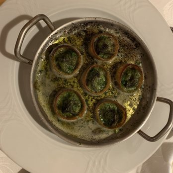 Le Crocodile Restaurant - Escargots Baked in Pastry Shells, served with Garlic Butter $24.00 - French Near Me - Vancouver, British Columbia Le Crocodile Restaurant - Escargots Baked in Pastry Shells, served with Garlic Butter $24.00 - French Near Me - Vancouver, British Columbia