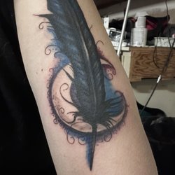 Addictive Nature Tattoo - Feather tattoo done by Gio