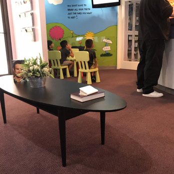 Millennium Dental - The waiting room , there's a corner where kids can watch DVD - General Dentistry Near Me - Stockton, California