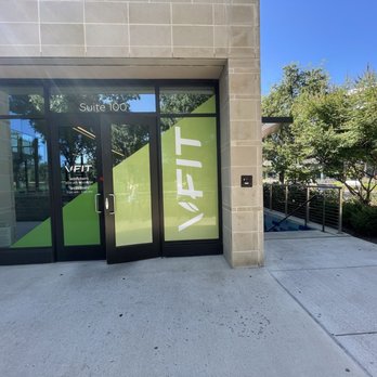 The Village Fit Gym - Entrance! The door is actually on the other side from the little street where you enter the village Commons (walk toward the fields) - Gyms Near Me - Dallas, Texas The Village Fit Gym - Entrance! The door is actually on the other side from the little street where you enter the village Commons (walk toward the fields) - Gyms Near Me - Dallas, Texas