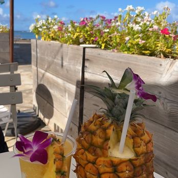 Barefoot Beach Cafe - Whole North Shore Pineapple smoothie and passion fruit smoothie - both were delicious! - Breakfast & Brunch Near Me - Honolulu, Hawaii