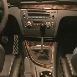 Before painting the wood trim around the shifter and ashtray. Before painting the wood trim around the shifter and ashtray.