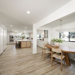 Code Construction - View of this full remodel from the dining area and kitchen.