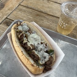 Metropolis Cheesesteaks - Philly Cheesesteak with mozzarella, peppers, and onions.