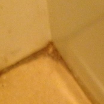 Days Inn by Wyndham Clinton - floor corner by the tub - Hotels Near Me - Clinton, Oklahoma