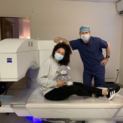 Photo of Manhattan Lasik Center - New York - New York, NY, US. SMILE Patient Cindy poses with Dr. Niksarli