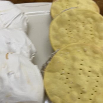 1derful Bakes - a plate of crackers and a bag of cheese - Bakeries Near Me