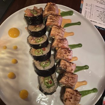 Across The Pond - Slamming salmon (right) and yellowtail roll - Cocktail Bars Near Me - Phoenix, Arizona Across The Pond - Slamming salmon (right) and yellowtail roll - Cocktail Bars Near Me - Phoenix, Arizona