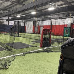 Hitter's Edge Baseball - Some of the many cages in the back.