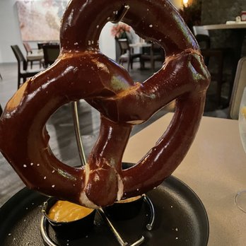 Laguna Restaurant & Bar - Their Bavarian Pretzel, with cheese & mustard dipping sauces - American Near Me - Orlando, Florida