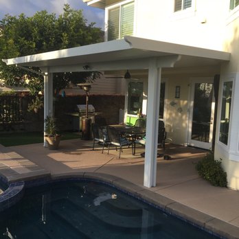 The Patio Man - Backyard patio cover, I'll be in a wood, solid roof. - Patio Coverings Near Me