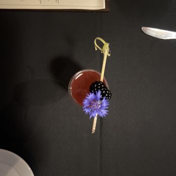 The Blackberry Brasserie - a purple flower on a stick - Cocktail Bars Near Me - Rogers, Arkansas