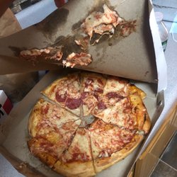 Yankees 99 Cent Hot Pizza - This is the worst pizza I ever had , and looks better because I fix it a little bit but the whole pizza was upside down