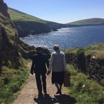 Blasket Island Ferry Services - Going down to catch ferry -Irish couple