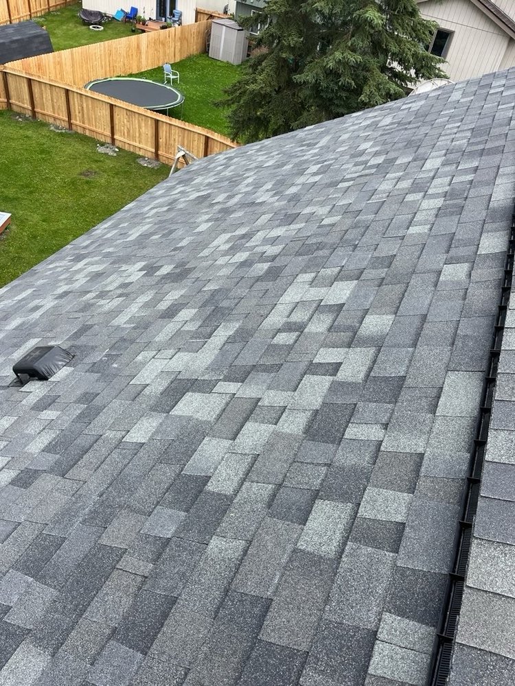 Slide of Harris Roofing