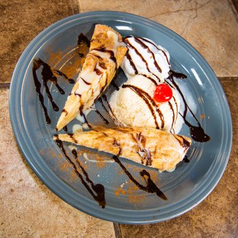Don Bigotes - a blue plate with ice cream and chocolate sauce - Mexican Near Me - Centre, Alabama Don Bigotes - a blue plate with ice cream and chocolate sauce - Mexican Near Me - Centre, Alabama