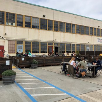 Faction Brewing - I like the picnic tables and seating outside. They even provide sunscreen. - Breweries Near Me - Alameda, California