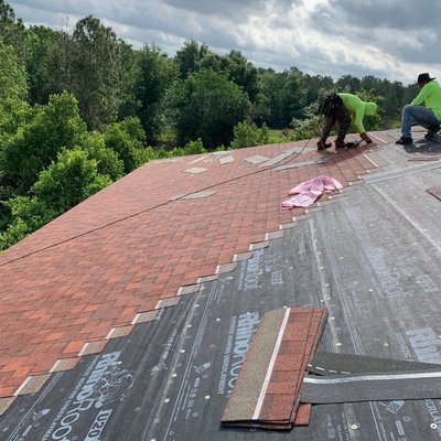 Texas Girl Roofing and Construction Logo