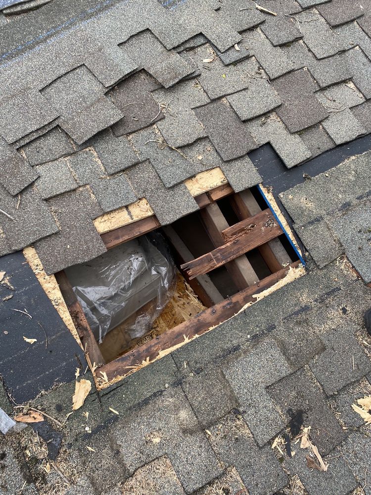 Slide of Los Reyes Roofing