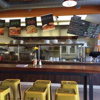 Mouthful Eatery - The register, cute chalk board menu, open kitchen, sorta hipster table and chairs - Sandwiches Near Me - Thousand Oaks, California