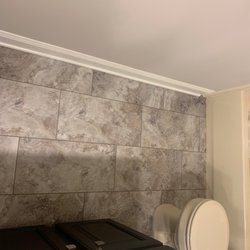 LL Flooring - Clinton Township - Molding, pattern and even underneath the bath tile trim What a wonderful install