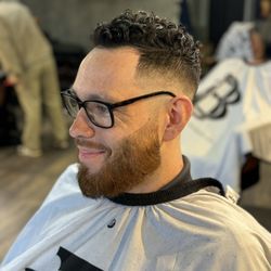 Beardsley's Barber Shop - Mid-high skin drop fade, beard lineup