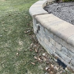 Lamphear's Lawn Service - Pushed out due to lack of drainage installed behind wall.
