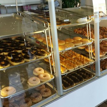 Fresh Donuts - a variety of donuts in a display case - Donuts Near Me - Buckeye, Arizona