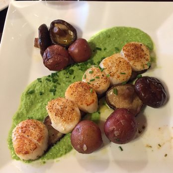 Fish Bones Grill - Seared scallops on pea purée with shiitake mushrooms and potatoes. - New American Near Me - Lewiston, Maine